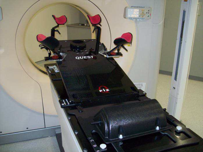 Showing ‘the breast board’ positioned on the CT Planning Scanner bed