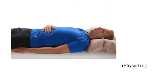 Image of person lying on their back, head on a pillow and one hand on their stomach.