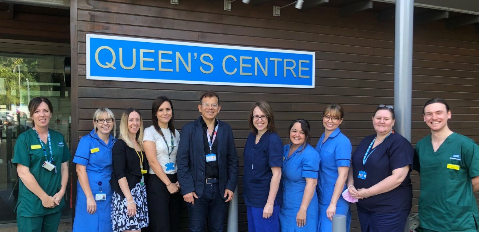 Members of the oncology multi disciplinary team outside the Queen's Centre